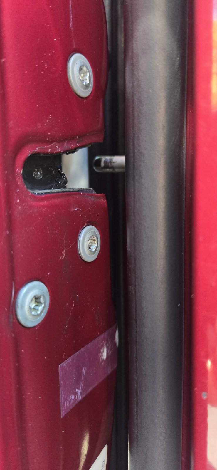 2002 Tundra - Driver side door latch - alignment view.jpg