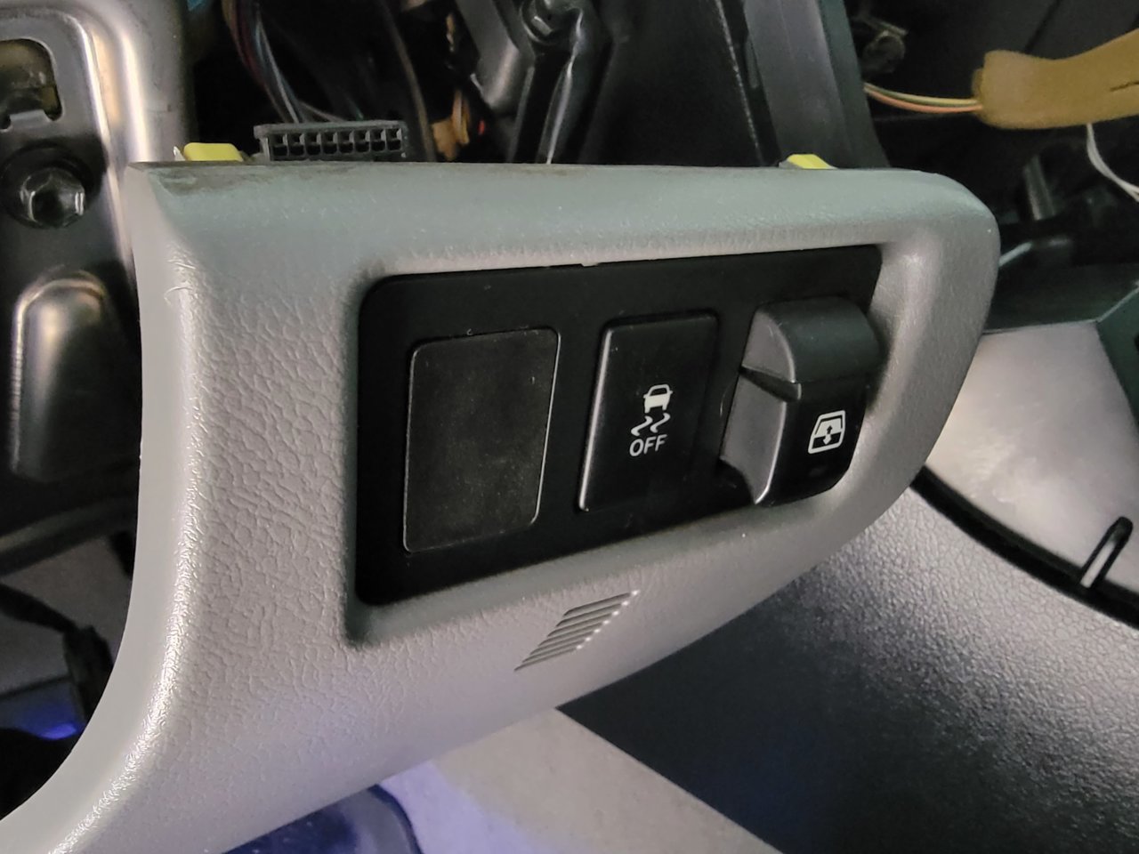 Anyone know what this plug below the steering wheel is for? | Toyota