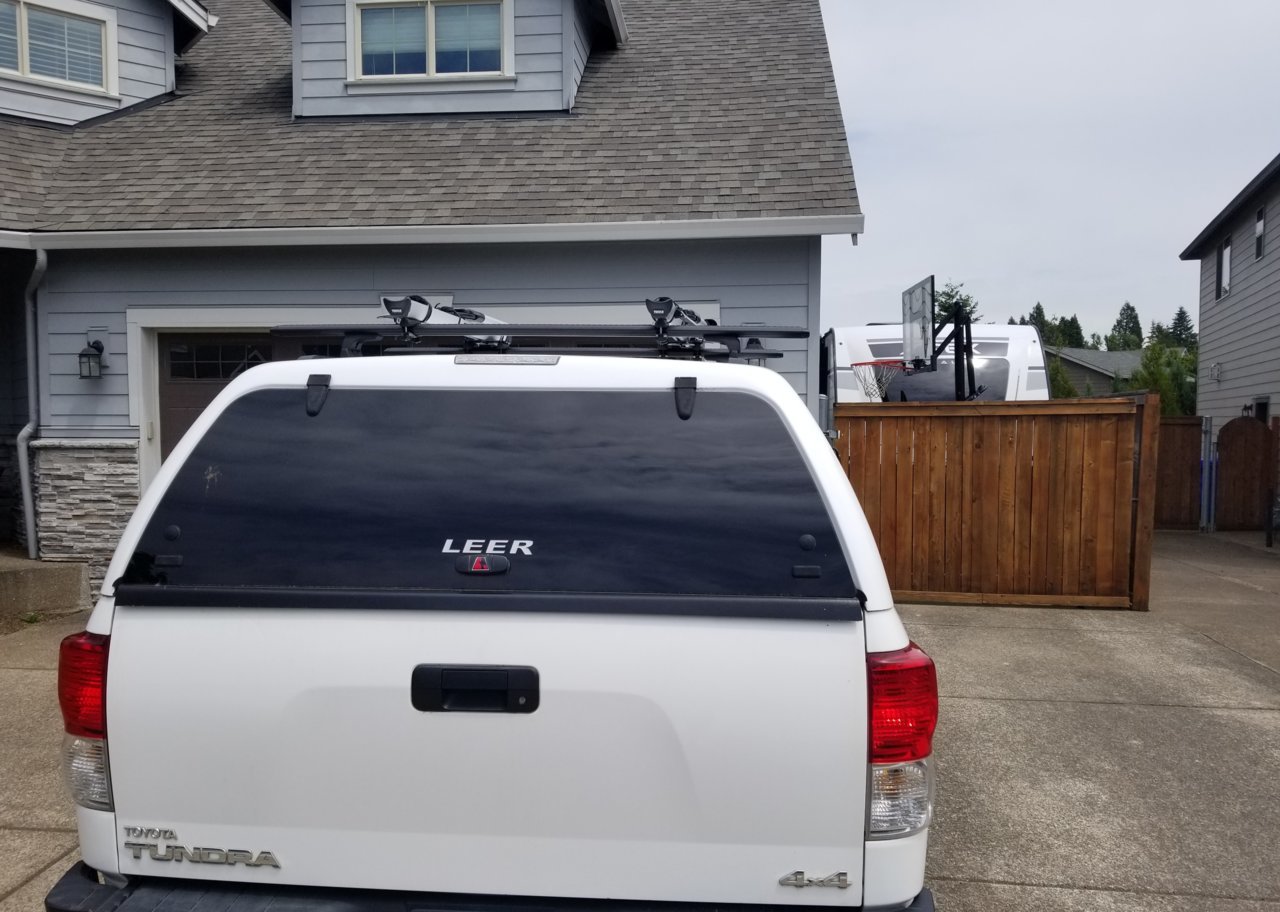 Yakima vs Rhino vs Thule crossbars for on top of canopy how long