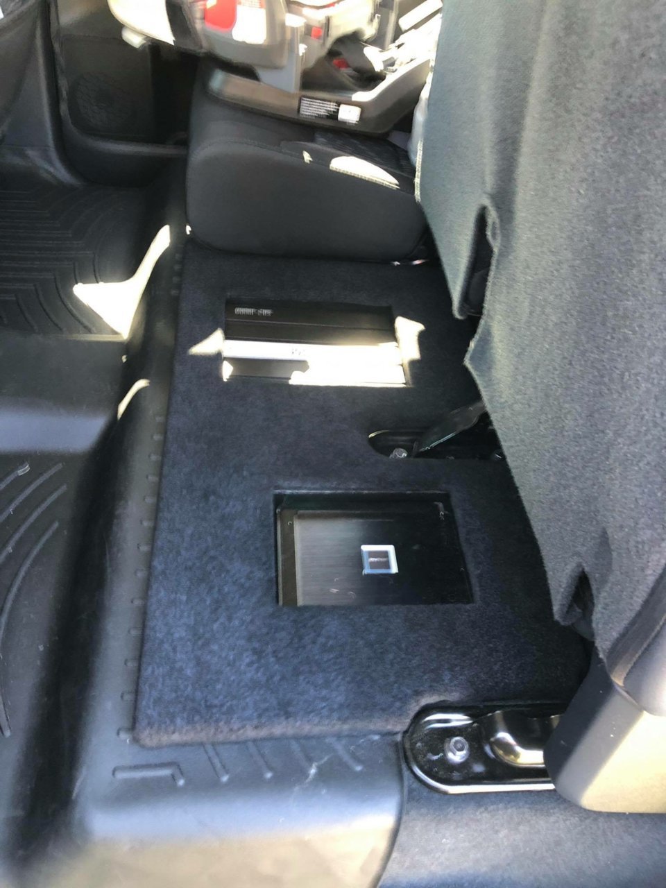 Mount amps under rear seat or under front seats? | Toyota Tundra Forum