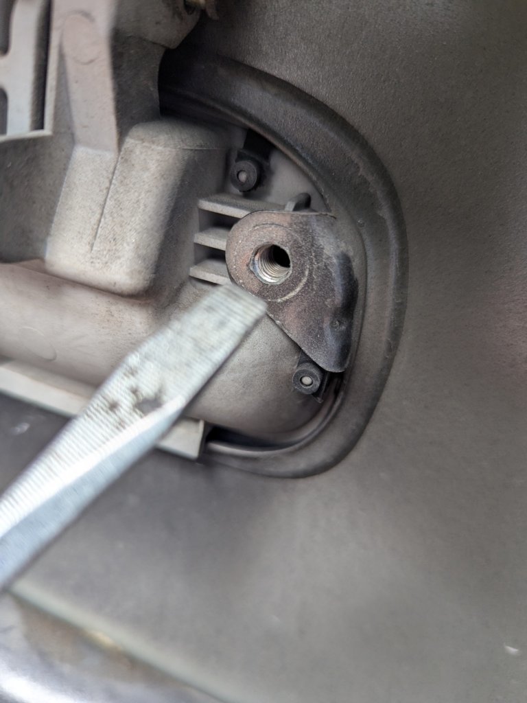 5.3 Remove door handle screw 2.jpg