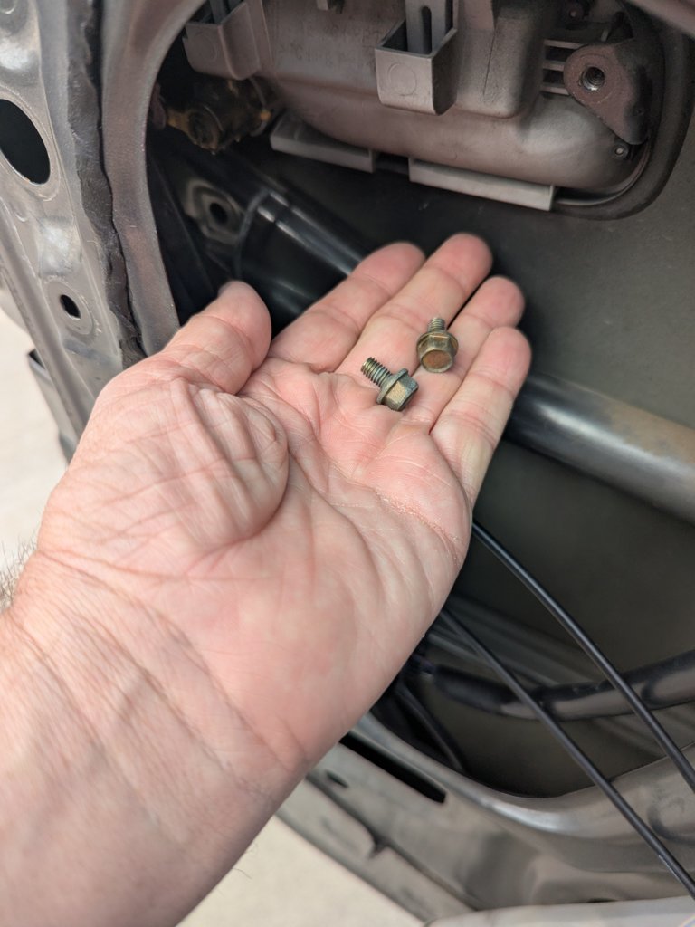 5.4 Remove door handle screws.jpg