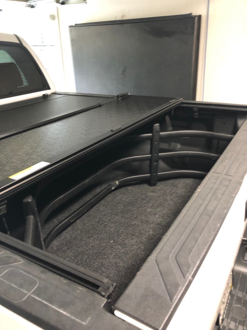 Amp Research Bed Extender.jpg