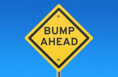 bump-ahead-road-sign-isolated-260nw-372933250.jpg