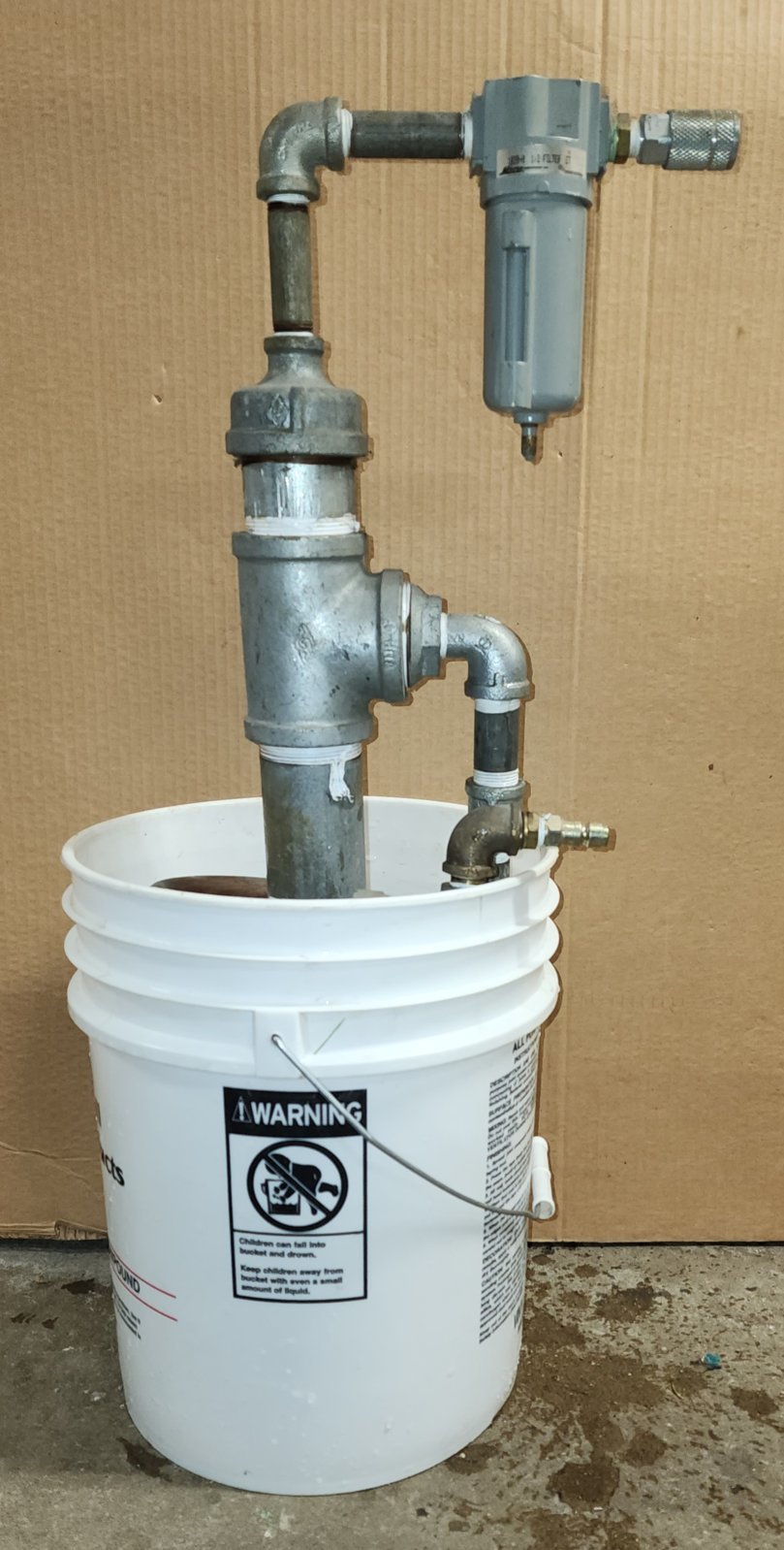 Condenser in bucket.jpg