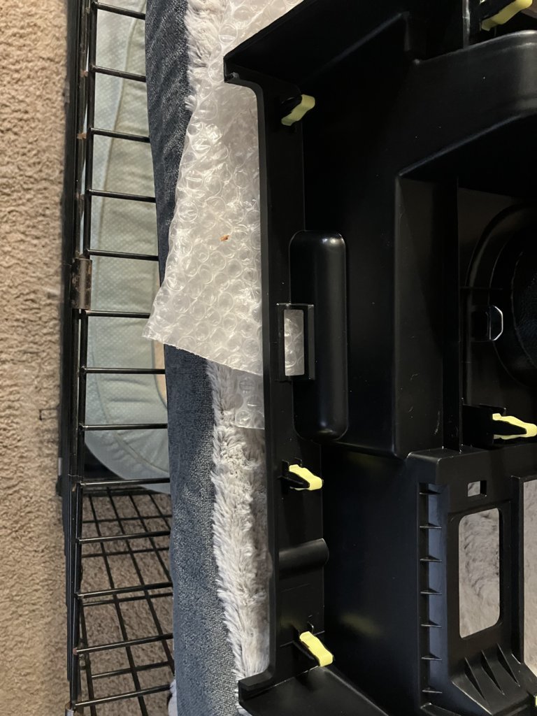 Console clips under lid.jpg
