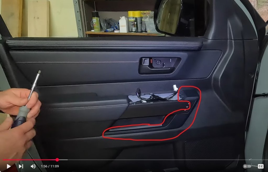 Driver door inner armrest trim.jpg