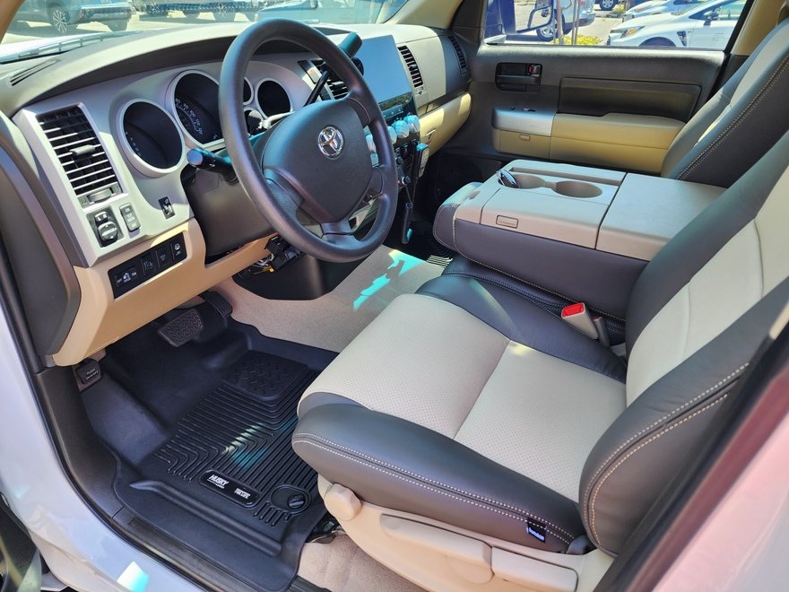 front_seats_looking_forward_steering_wheel.jpg