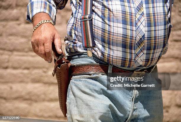 overweight-cowboy-wearing-a-holster-and-gun.jpg