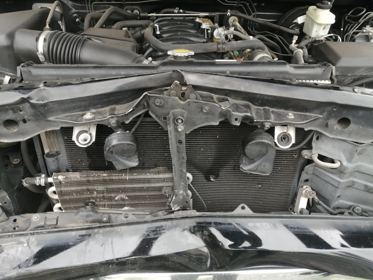 radiaotor support damaged including radioator and oil cooler  and AC Lines.jpg