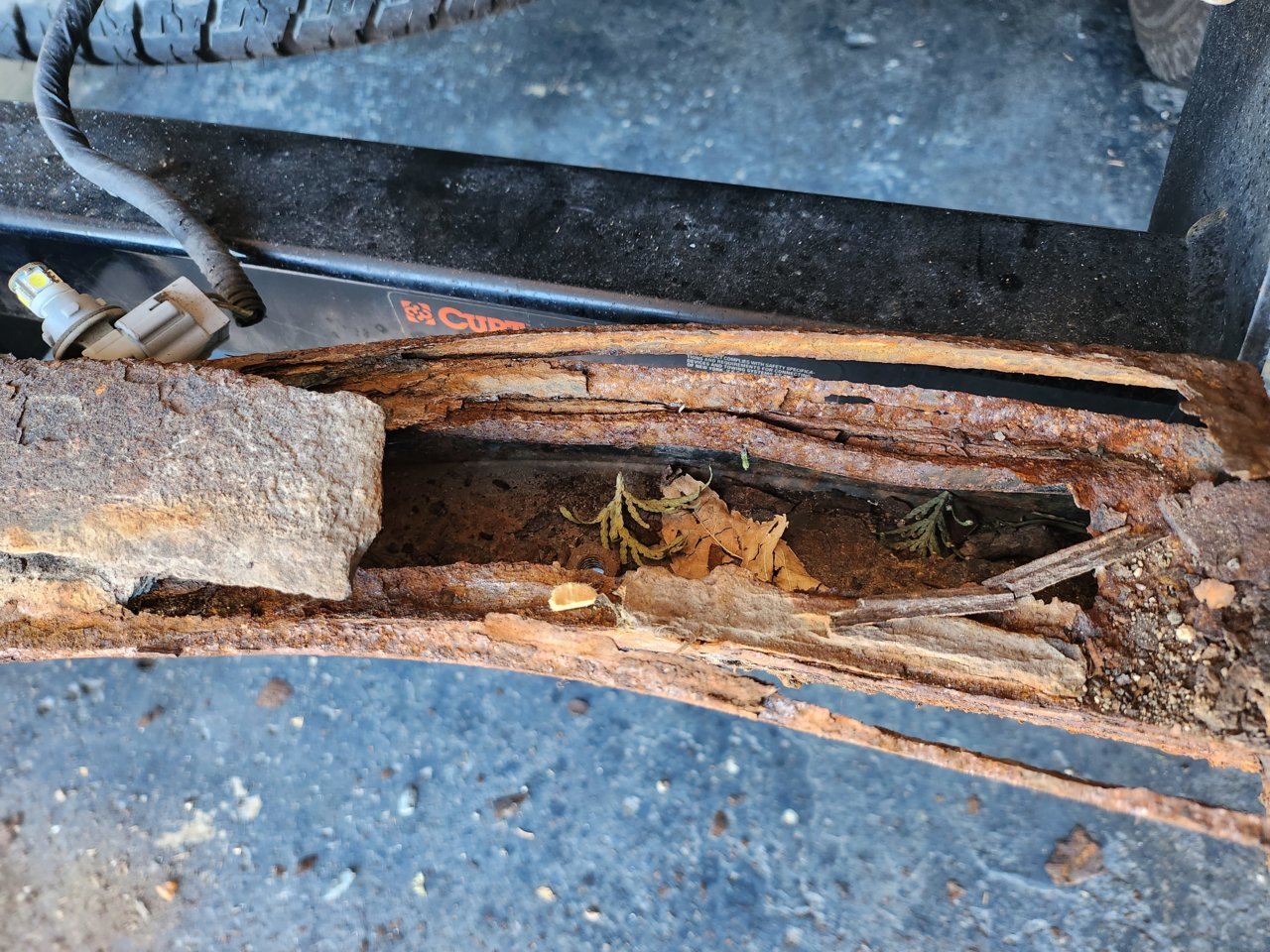 rust on right side of bumper reinforcement.jpg