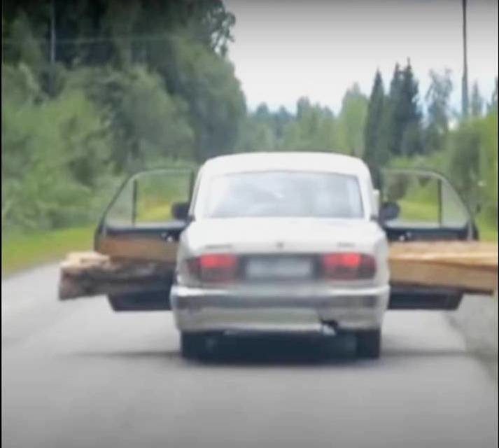 sedan carrying wood .jpg