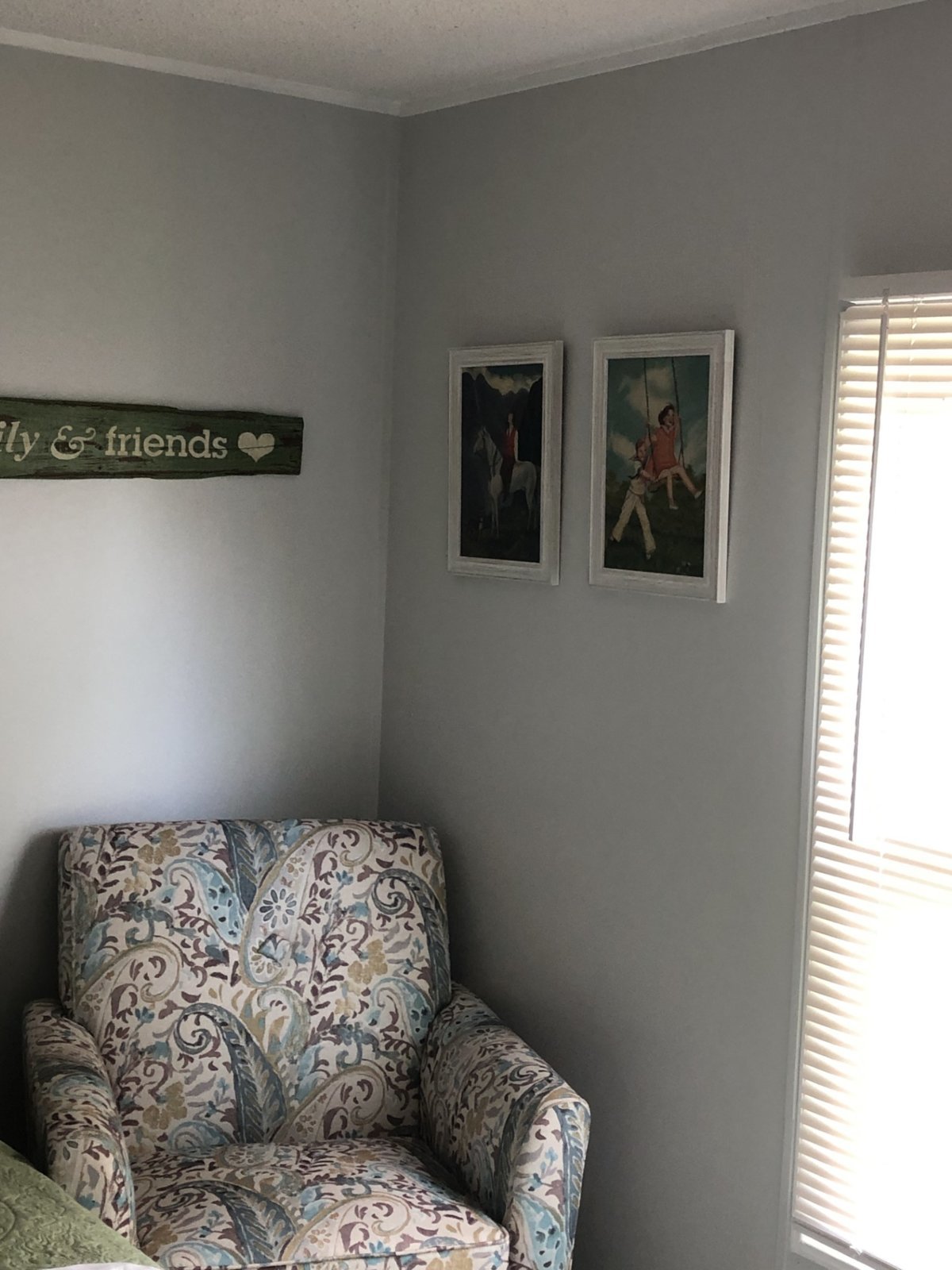 Spare with new chair and Moms saved paintings.jpg