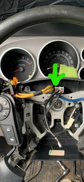 Steering wheel with radio controls.jpg