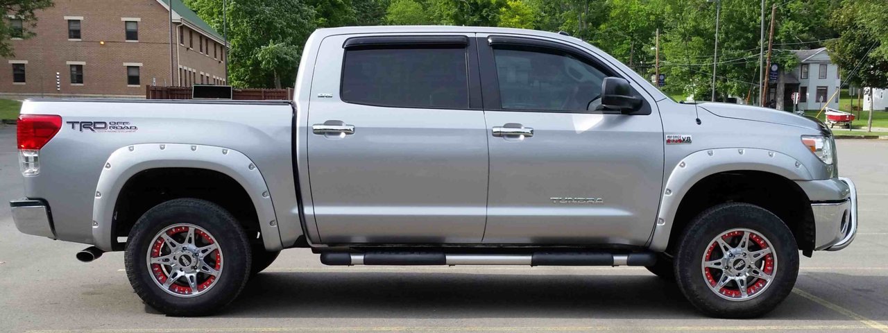 Stock tires with lift.jpg