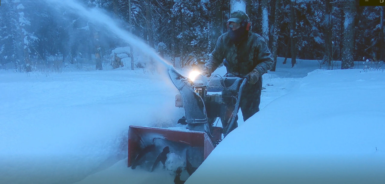 Throwing Snow on Trail Cam.jpg