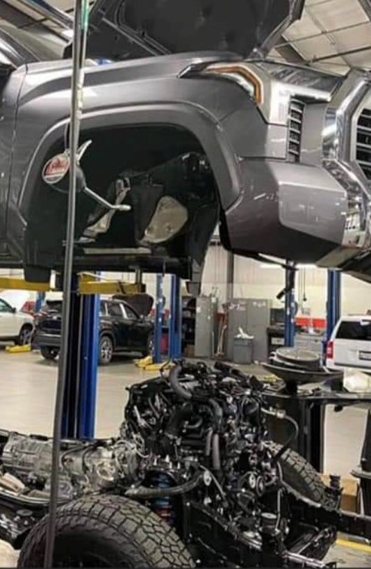 tundra lifted for repair.jpg