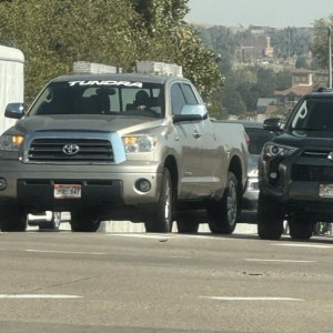 Oh thank goodness he has a decal on the windshield. I would have never known it was a tundra