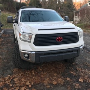 Phase 2 of operation de-chrome complete. Plastidipped hood bulge. Also added a shorty antenna today