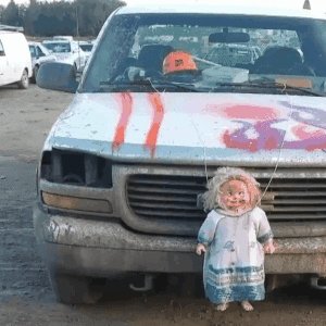 Spooky Doll On Truck