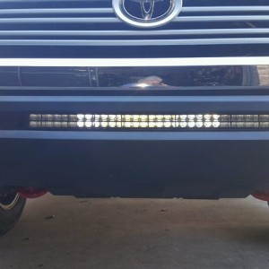 Just finished installing a 32" LED light bar behind the grill...