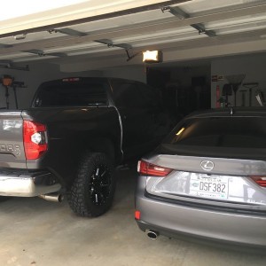 Sitting in the garage, both fighting for me to choose them for the 500 mile road trip tomorrow. Pretty sure the space of the tundra will win, despite