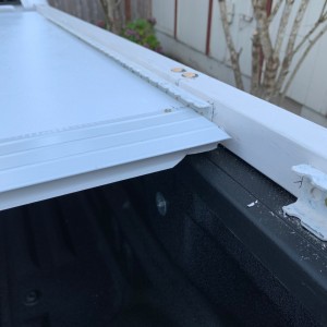 roof flashing at joint between panels