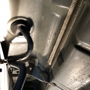 grommet under driver's seat