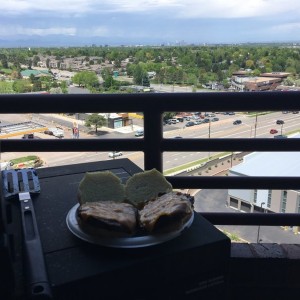 Grilling cheeseburgers for lunch at the office deck