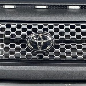 Freshly Rhino lined hood bulge and grille surround!