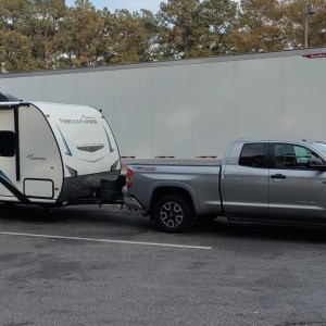 My SR5 double cab towing our Coachmen